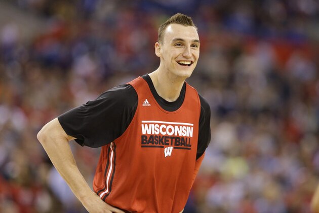 Wisconsin's Sam Dekker smiles during a practice session for the NCAA Final Four tournament college basketball semifinal game Friday, April 3, 2015, in Indianapolis. Wisconsin plays Kentucky on Saturday. (AP Photo/Michael Conroy)