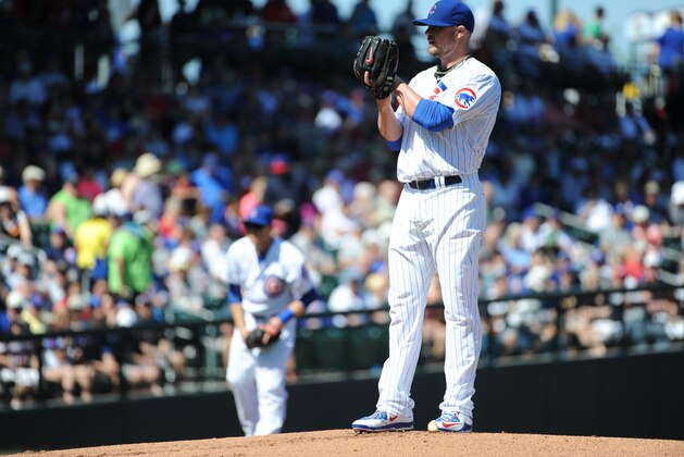 MESA, AZ - MARCH 6: Jon Lester #34 of the Chicago Cubs pitches during the game against the Cincinnati Reds on March 6, 2015 at Sloan Park in Mesa, Arizona. The Reds defeated the Cubs 5-2. (Photo by Rich Pilling/Getty Images)