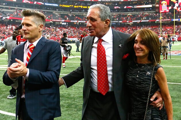 ATLANTA, GA - SEPTEMBER 07:  Atlanta Falcons general manager Thomas Dimitroff, team owner Arthur Blank, and Angela Macuga celebrate their 37-34 overtime win over the New Orleans Saints at Georgia Dome on September 7, 2014 in Atlanta, Georgia.  (Photo by Kevin C. Cox/Getty Images)