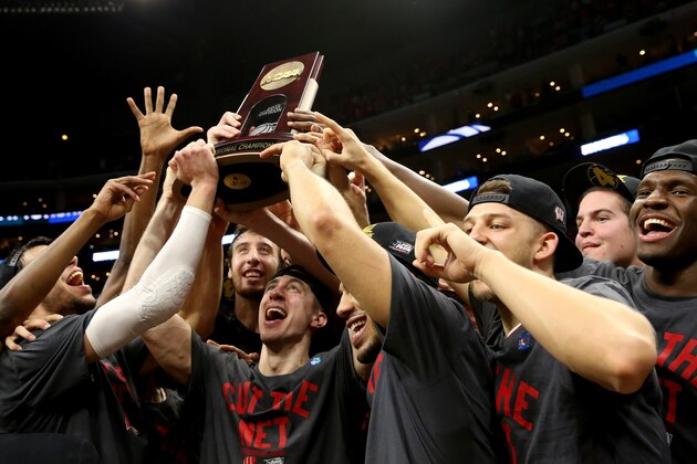 LOS ANGELES, CA - MARCH 28:  The Wisconsin Badgers celebrate after their 85-78 victory against the Arizona Wildcats during the West Regional Final of the 2015 NCAA Men's Basketball Tournament at Staples Center on March 28, 2015 in Los Angeles, California.  (Photo by Stephen Dunn/Getty Images)
