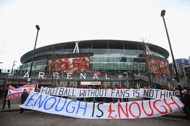 LONDON, ENGLAND - APRIL 04:  Fans display banners outside the ground prior to the Barclays Premier League match between Arsenal and Liverpool at Emirates Stadium on April 4, 2015 in London, England.  (Photo by Paul Gilham/Getty Images)