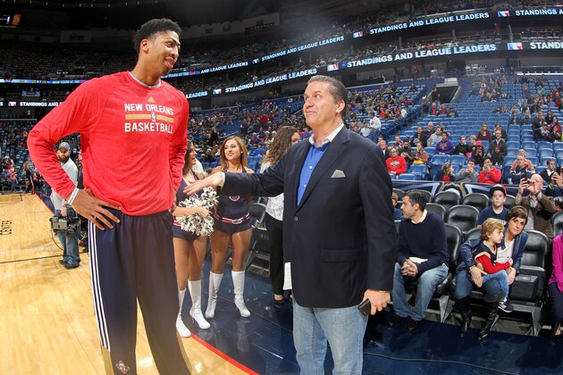 NEW ORLEANS, LA -  DECEMBER 30: Anthony Davis #23 of the New Orleans Pelicans and John Calipari Head Coach of the University of Kentucky speak before a game against the Phoenix Suns on December 30, 2014 at Smoothie King Center in New Orleans, Louisiana. NOTE TO USER: User expressly acknowledges and agrees that, by downloading and or using this Photograph, user is consenting to the terms and conditions of the Getty Images License Agreement. Mandatory Copyright Notice: Copyright 2014 NBAE (Photo by Layne Murdoch/NBAE via Getty Images)