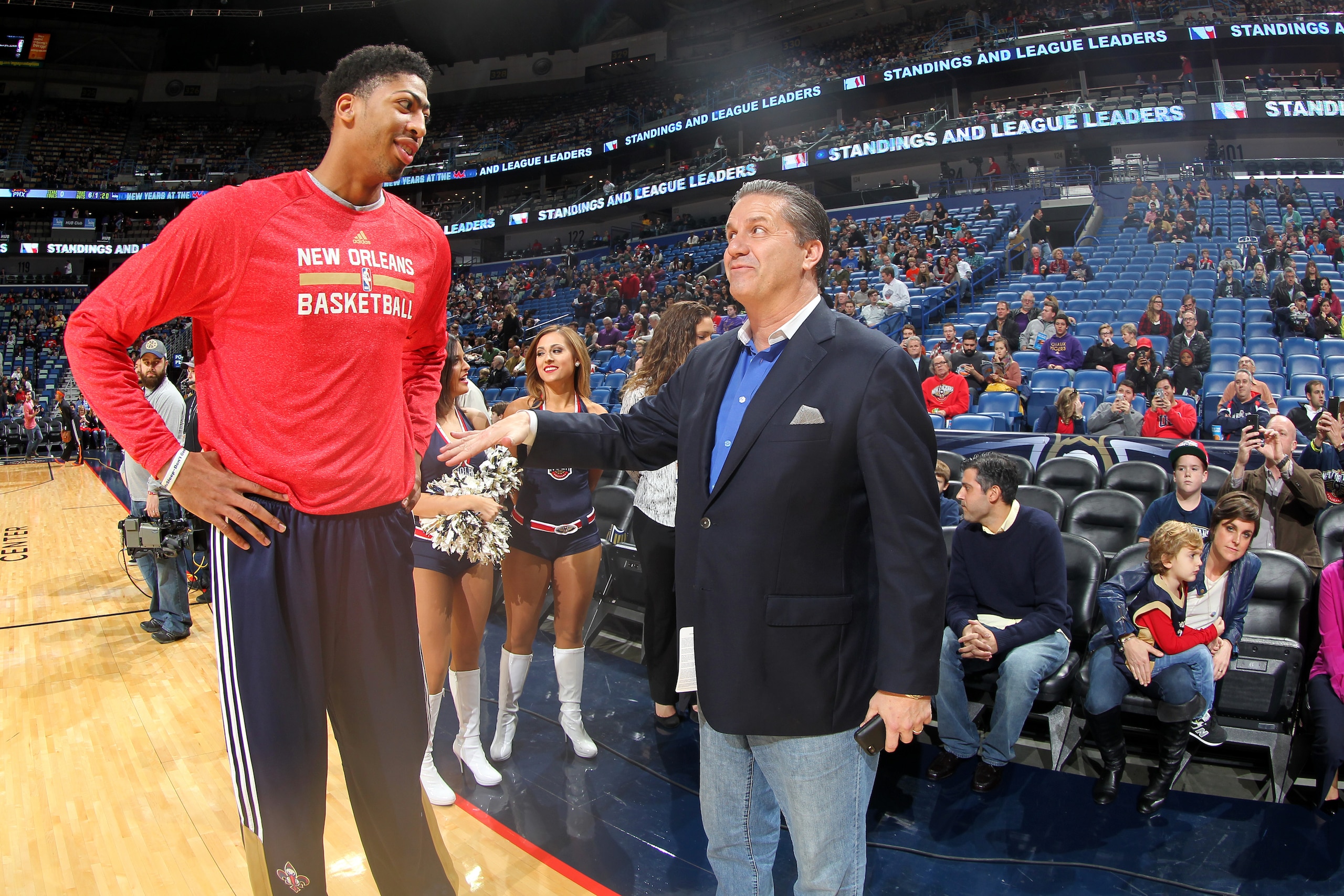 NEW ORLEANS, LA -  DECEMBER 30: Anthony Davis #23 of the New Orleans Pelicans and John Calipari Head Coach of the University of Kentucky speak before a game against the Phoenix Suns on December 30, 2014 at Smoothie King Center in New Orleans, Louisiana. NOTE TO USER: User expressly acknowledges and agrees that, by downloading and or using this Photograph, user is consenting to the terms and conditions of the Getty Images License Agreement. Mandatory Copyright Notice: Copyright 2014 NBAE (Photo by Layne Murdoch/NBAE via Getty Images)