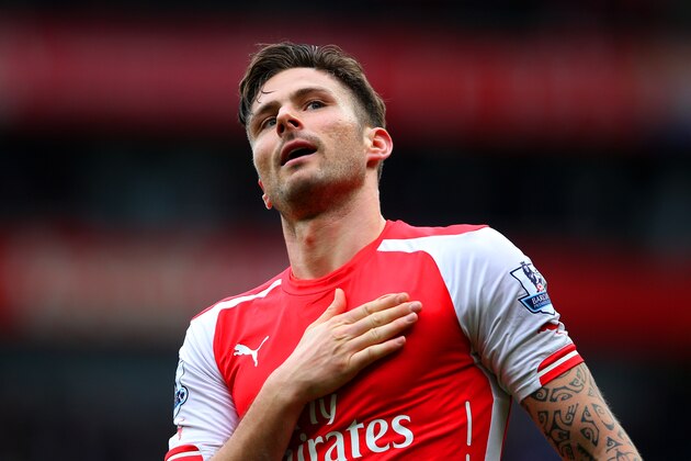 LONDON, ENGLAND - APRIL 04:  Olivier Giroud of Arsenal celebrates after scoring his team's fourth goal during the Barclays Premier League match between Arsenal and Liverpool at Emirates Stadium on April 4, 2015 in London, England.  (Photo by Paul Gilham/Getty Images)