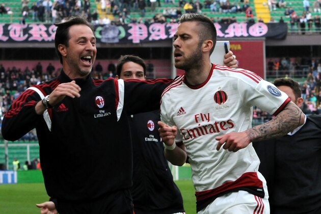 Jeremy Menez celebrates with teammates after scoring during the Serie A soccer match between Palermo and Milan, in Palermo, Italy, Saturday April 4,  2015. (AP Photo/Alessandro Fucarini)