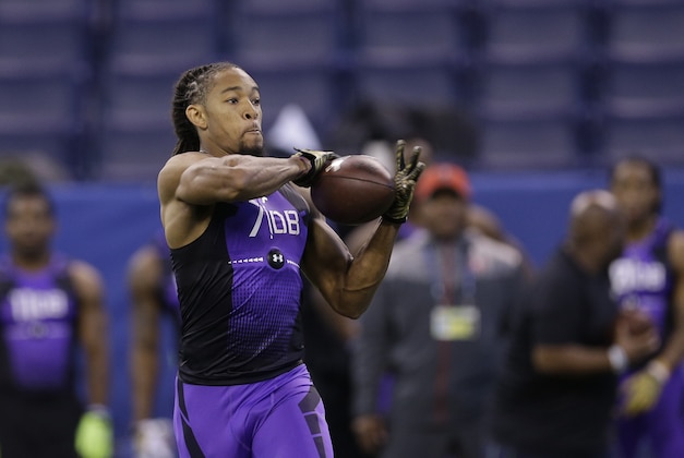 LSU defensive back Jalen Collins runs a drill at the NFL football scouting combine in Indianapolis, Monday, Feb. 23, 2015. (AP Photo/David J. Phillip)