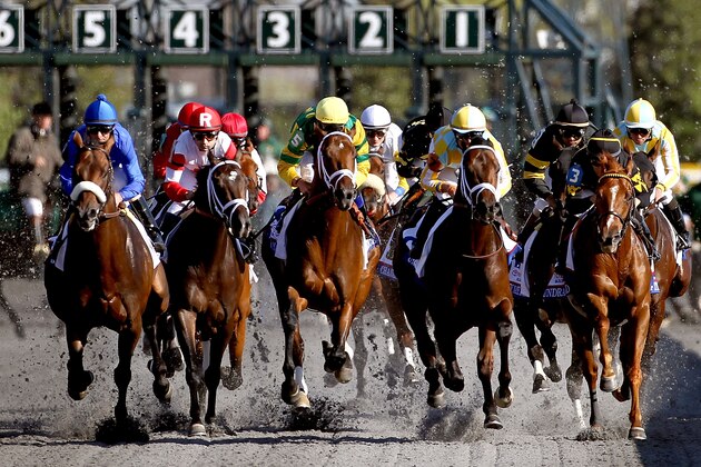 LEXINGTON, KY - APRIL 13: Horses head down the front stretch during the 89th Toyota Blue Grass Stakes at Keenland Race Course on April 13, 2013 in Lexington, Kentucky.  (Photo by Matthew Stockman/Getty Images)