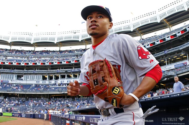 NEW YORK, NY - JUNE 28: Mookie Betts #50 of the Boston Red Sox takes the field before the start of a game against the New York Yankees at Yankee Stadium on June 28, 2014 in the Bronx borough of New York City. (Photo by Rich Schultz/Getty Images)