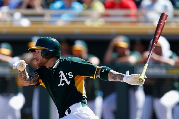 MESA, AZ - MARCH 10:  Brett Lawrie #15 of the Oakland Athletics bats against the Arizona Diamondbacks during the spring training game at HoHoKam Stadium on March 10, 2015 in Mesa, Arizona.  (Photo by Christian Petersen/Getty Images)