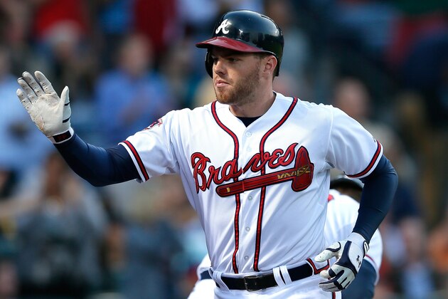 ATLANTA, GA - MAY 19:  Freddie Freeman #5 of the Atlanta Braves celebrates a solo homer in the third inning against the Milwaukee Brewers at Turner Field on May 19, 2014 in Atlanta, Georgia.  (Photo by Kevin C. Cox/Getty Images)