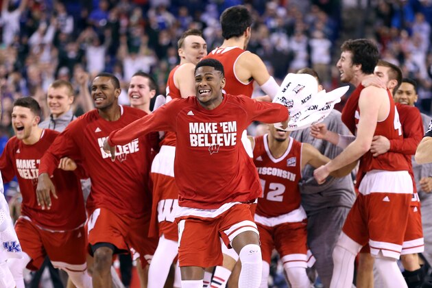 INDIANAPOLIS, IN - APRIL 04: Vitto Brown #30 of the Wisconsin Badgers celebrates with teammates after defeating the Kentucky Wildcats during the NCAA Men's Final Four Semifinal at Lucas Oil Stadium on April 4, 2015 in Indianapolis, Indiana. Wisconsin defeated Kentucky 71-64. (Photo by Andy Lyons/Getty Images)