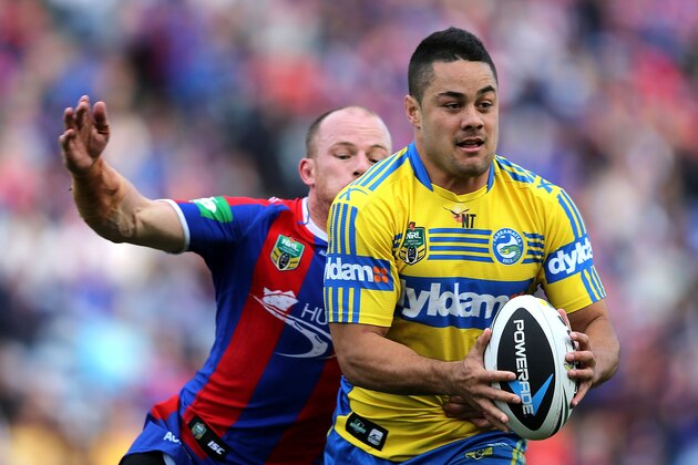 NEWCASTLE, AUSTRALIA - AUGUST 30: Jarryd Hayne of the Eels evades Beau Scott of the Knights during the round 25 NRL match between the Newcastle Knights and the Parramatta Eels at Hunter Stadium on August 30, 2014 in Newcastle, Australia. (Photo by Ashley Feder/Getty Images) NEWCASTLE, AUSTRALIA - AUGUST 30: Jarryd Hayne of the Eels evades Beau Scott of the Knights during the round 25 NRL match between the Newcastle Knights and the Parramatta Eels at Hunter Stadium on August 30, 2014 in Newcastle, Australia. (Photo by Ashley Feder/Getty Images)