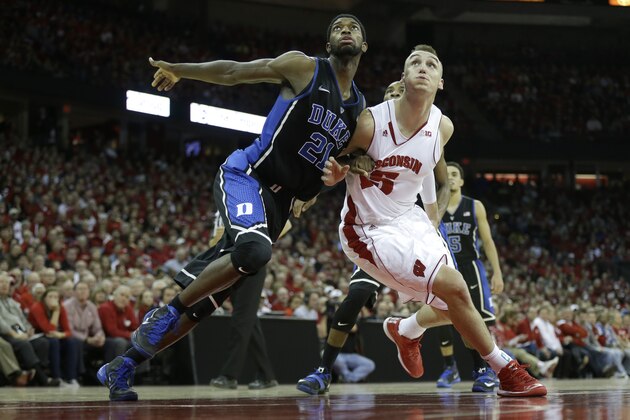 MADISON, WI - DECEMBER 03: Amile Jefferson #21 of the Duke Blue Devils boxes out Sam Dekker #15 of the Wisconsin Badgers for the rebound during the second half at Kohl Center on December 03, 2014 in Madison, Wisconsin. (Photo by Mike McGinnis/Getty Images)