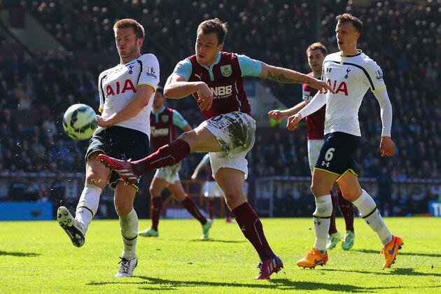 BURNLEY, ENGLAND - APRIL 05:  Ashley Barnes of Burnley shoots under pressure from Eric Dier of Spurs during the Barclays Premier League match between Burnley and Tottenham Hotspur at Turf Moor on April 5, 2015 in Burnley, England.  (Photo by Alex Livesey/Getty Images)