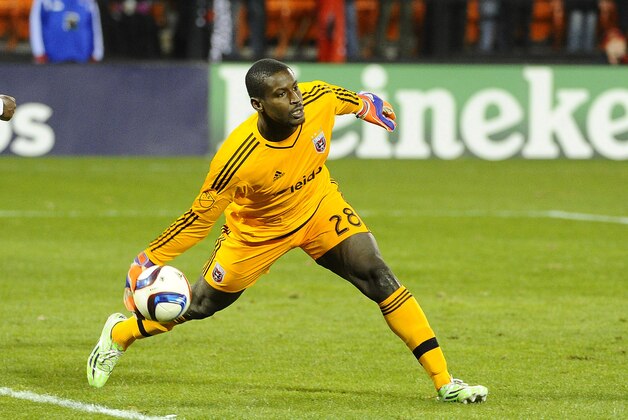 Mar 28, 2015; Washington, DC, USA; D.C. United goalkeeper Bill Hamid (28) passes the ball against the Los Angeles Galaxy during the second half  at Robert F. Kennedy Memorial. Mandatory Credit: Brad Mills-USA TODAY Sports