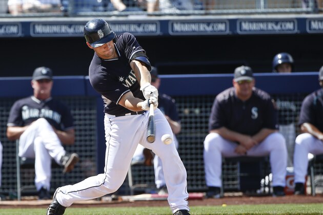 Seattle Mariners' Mike Zunino rips a two run double against the Los Angeles Angels in the fourth inning of a spring training baseball game Monday, March 30, 2015, in Peoria, Ariz.  (AP Photo/Lenny Ignelzi)