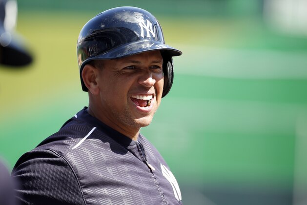 New York Yankees third baseman Alex Rodriguez (13) smiles during batting practice before an exhibition baseball game against the Washington Nationals at Nationals Park, Saturday, April 4, 2015, in Washington. (AP Photo/Alex Brandon)