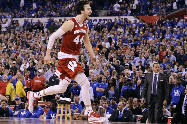 Wisconsin's Frank Kaminsky celebrates on the court after an NCAA Final Four tournament college basketball semifinal game against Kentucky Saturday, April 4, 2015, in Indianapolis. Wisconsin won 71-64.(AP Photo/David J. Phillip)