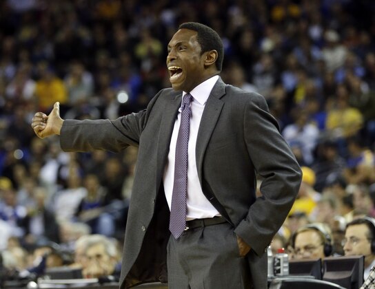Brooklyn Nets head coach Avery Johnson instructs his team against the Golden State Warriors during the first half of an NBA basketball game in Oakland, Calif., Wednesday, Nov. 21, 2012. (AP Photo/Marcio Jose Sanchez)