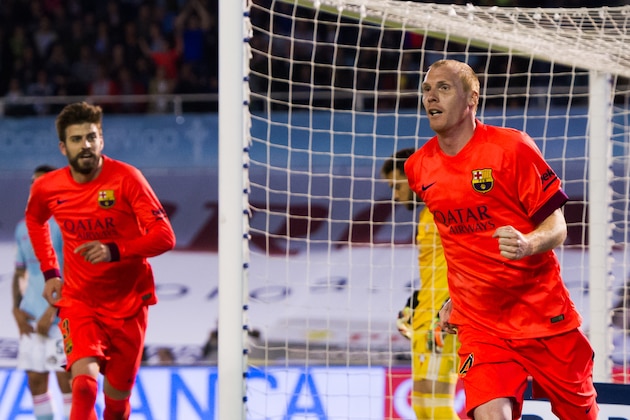 VIGO, SPAIN - APRIL 05: Jeremy Mathieu of FC Barcelona celebrates after scoring the opening goal during the La Liga match between Celta Vigo and FC Barcelona at Estadio Balaidos on April 5, 2015 in Vigo, Spain. (Photo by Alex Caparros/Getty Images)
