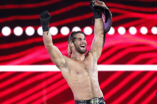 WWE Superstar Seth Rollins celebrates becoming the new WWE World Heavyweight Champion at WrestleMania 31 at Levi's Stadium on Sunday, March 29, 2015 in Santa Clara, CA. WrestleMania broke the Levi’s Stadium attendance record at 76,976 fans from all 50 states and 40 countries. (Don Feria/AP Images for WWE)