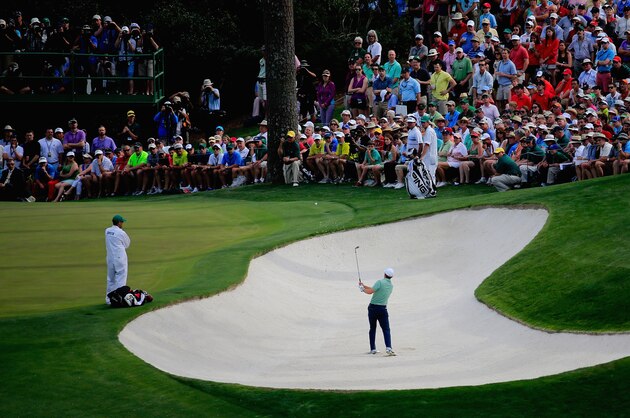 AUGUSTA, GA - APRIL 13:  Jordan Spieth of the United States hits a shot out of the bunker on the 10th hole during the final round of the 2014 Masters Tournament at Augusta National Golf Club on April 13, 2014 in Augusta, Georgia.  (Photo by Rob Carr/Getty Images)
