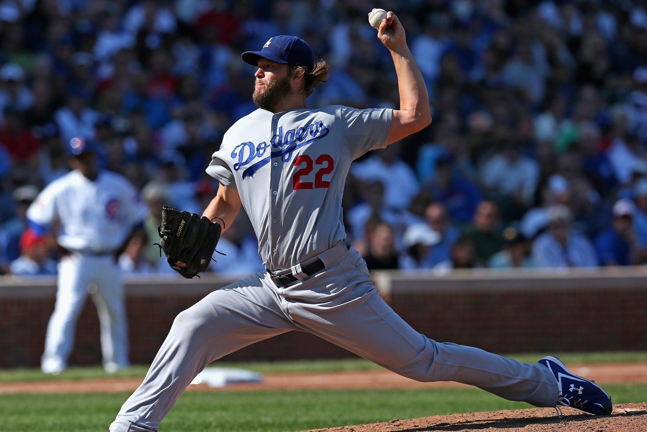 CHICAGO, IL - SEPTEMBER 19:  Clayton Kershaw #22 of the Los Angeles Dodgers pitches on his way to his 20th win of the season against the Chicago Cubs at Wrigley Field on September 19, 2014 in Chicago, Illinois. The Dodgers defeated the Cubs 14-5.  (Photo by Jonathan Daniel/Getty Images)