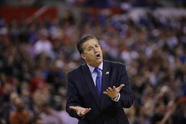 Kentucky head coach John Calipari reacts to a call during the second half of the NCAA Final Four tournament college basketball semifinal game against Wisconsin Saturday, April 4, 2015, in Indianapolis. Wisconsin won 71-64. (AP Photo/David J. Phillip)