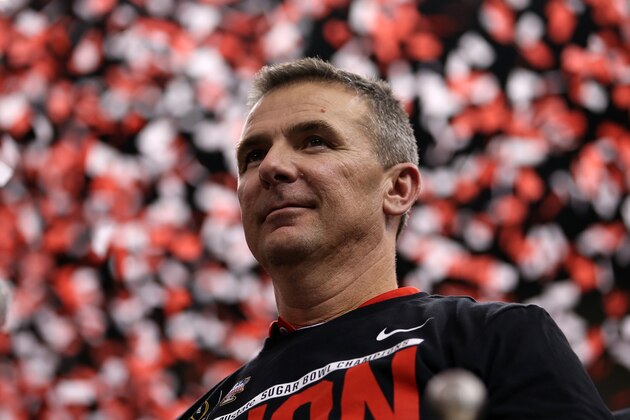 NEW ORLEANS, LA - JANUARY 01:  Head coach Urban Meyer of the Ohio State Buckeyes celebrates with the trophy after defeating the Alabama Crimson Tide in the All State Sugar Bowl at the Mercedes-Benz Superdome on January 1, 2015 in New Orleans, Louisiana.  The Ohio State Buckeyes defeated the Alabama Crimson Tide 42 to 35.  (Photo by Chris Graythen/Getty Images)