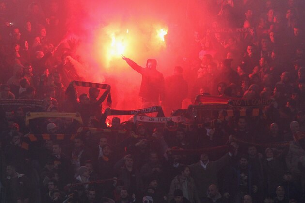 ROME, ITALY - MARCH 02:  AS Roma fans support their team during the Serie A match between AS Roma and Juventus FC at Stadio Olimpico on March 2, 2015 in Rome, Italy.  (Photo by Paolo Bruno/Getty Images)