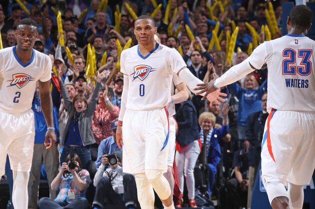 OKLAHOMA CITY, OK - APRIL 5:  Russell Westbrook #0 of the Oklahoma City Thunder celebrates with his teammates during the game against the Houston Rockets on April 5, 2015 at the Chesapeake Energy Arena in Oklahoma City, Oklahoma. NOTE TO USER: User expressly acknowledges and agrees that, by downloading and or using this Photograph, user is consenting to the terms and conditions of the Getty Images License Agreement. Mandatory Copyright Notice: Copyright 2015 NBAE (Photo by Layne Murdoch Jr./NBAE via Getty Images)