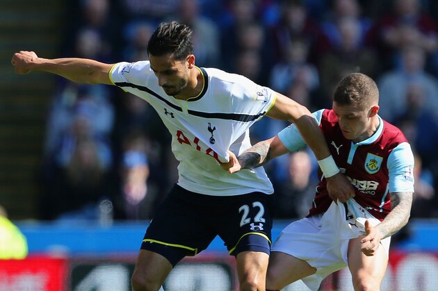 BURNLEY, ENGLAND - APRIL 05:  Nacer Chadli of Spurs and Kieran Trippier of Burnley compete for the ball during the Barclays Premier League match between Burnley and Tottenham Hotspur at Turf Moor on April 5, 2015 in Burnley, England.  (Photo by Jan Kruger/Getty Images)