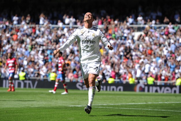 MADRID, SPAIN - APRIL 05:  Cristiano Ronaldo of Real Madrid CF celebrates after scoring his team's 3rd goal during the La Liga match between Real Madrid CF and Granada CF at Estadio Santiago Bernabeu on April 5, 2015 in Madrid, Spain.  (Photo by Denis Doyle/Getty Images)