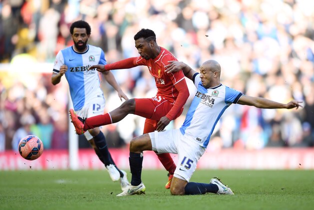LIVERPOOL, ENGLAND - MARCH 08:  Daniel Sturridge of Liverpool is tackled by Alex Baptiste of Blackburn during the FA Cup Quarter Final match between Liverpool and Blackburn Rovers at Anfield on March 8, 2015 in Liverpool, England.  (Photo by Michael Regan/Getty Images)
