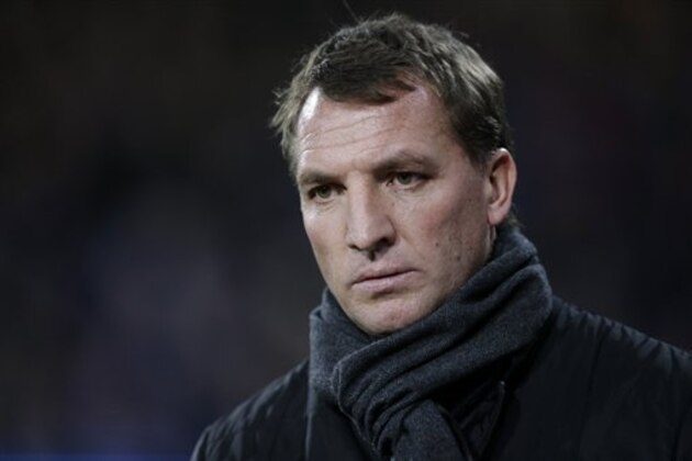 Liverpool's manager Brendan Rodgers arrives for the start of the English FA Cup fifth round soccer match between Crystal Palace and Liverpool at Selhurst Park stadium in London, Saturday, Feb. 14, 2015.  (AP Photo/Matt Dunham)