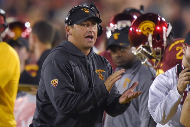 Southern California coach Steve Sarkisian claps during the second half of an NCAA college football game against California, Thursday, Nov. 13, 2014, in Los Angeles. USC won 38-30. (AP Photo/Mark J. Terrill)