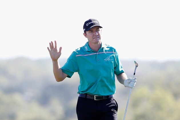 SAN ANTONIO, TX - MARCH 29: Jimmy Walker waves to the crowd as he walks up the 18th hole during the final round of the Valero Texas Open at TPC San Antonio AT&T Oaks Course on March 29, 2015 in San Antonio, Texas.  (Photo by Christian Petersen/Getty Images)