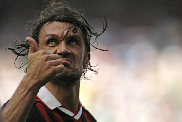 AC Milan defender Paolo Maldini salutes his fans at the end of the Italian Serie A soccer match between AC Milan and AS Roma at the San Siro stadium in Milan, Italy, Sunday, May 24, 2009. AC Milan captain 40 year-old Paolo Maldini played his last match at the San Siro stadium Sunday after 24 years and 901 games for the club.The match against AS Roma comes a week before the last game of the season away to Fiorentina and will bring to an end a career in which he has won seven Italian league titles, five Champions Leagues and 126 caps for Italy. (AP Photo/Alberto Pellaschiar)