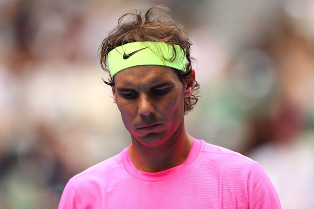 MELBOURNE, AUSTRALIA - JANUARY 27:  Rafael Nadal of Spain looks on in his quarterfinal match against Tomas Berdych of the Czech Republic during day nine of the 2015 Australian Open at Melbourne Park on January 27, 2015 in Melbourne, Australia.  (Photo by Cameron Spencer/Getty Images)
