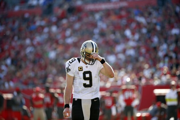 New Orleans Saints quarterback Drew Brees (9) waits for the end of the television timeout during an NFL football game against the Tampa Bay Buccaneers on Sunday, Dec. 28, 2014, in Tampa, Fla. (AP Photo/Brian Blanco)