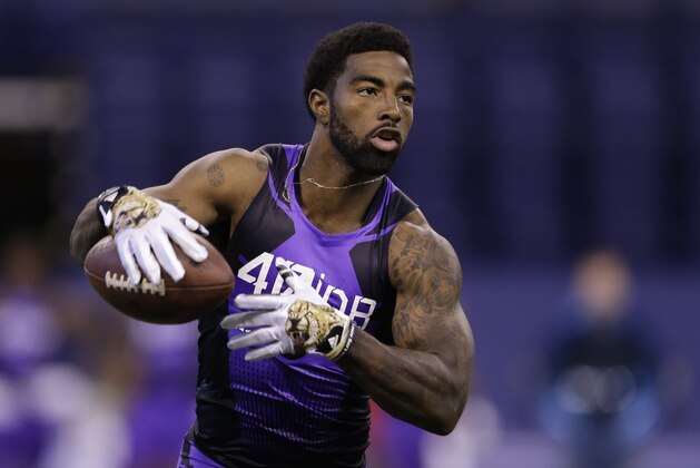 Miami of Ohio defensive back Quinten Rollins runs a drill at the NFL football scouting combine in Indianapolis, Monday, Feb. 23, 2015. (AP Photo/Julio Cortez)