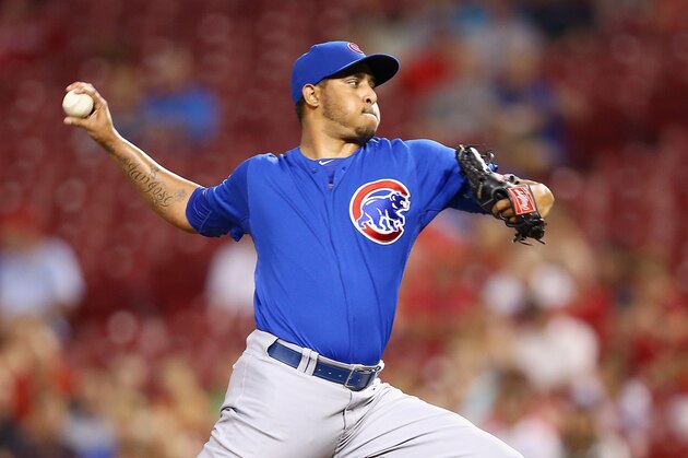 CINCINNATI, OH - AUGUST 26:  Hector Rondon #56 of the Chicago Cubs throws a pitch against the Cincinnati Reds during the game against at Great American Ball Park on August 26, 2014 in Cincinnati, Ohio.  (Photo by Andy Lyons/Getty Images)