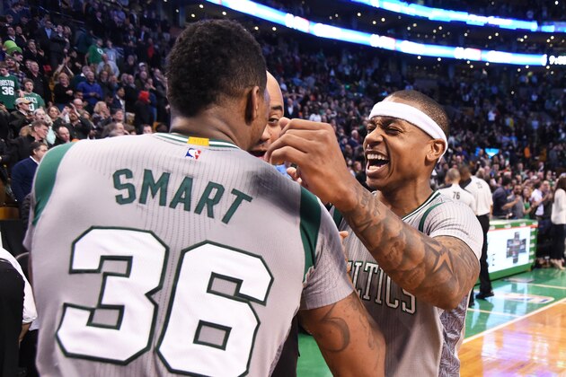 BOSTON, MA - MARCH 4:  Marcus Smart #36 and Isaiah Thomas #4 of the Boston Celtics celebrates after winning in the final second of the game against the Utah Jazz on March 4, 2015 at TD Garden in Boston, Massachusetts.  NOTE TO USER: User expressly acknowledges and agrees that, by downloading and or using this Photograph, user is consenting to the terms and conditions of the Getty Images License Agreement. Mandatory Copyright Notice: Copyright 2015 NBAE (Photo by Brian Babineau/NBAE via Getty Images)