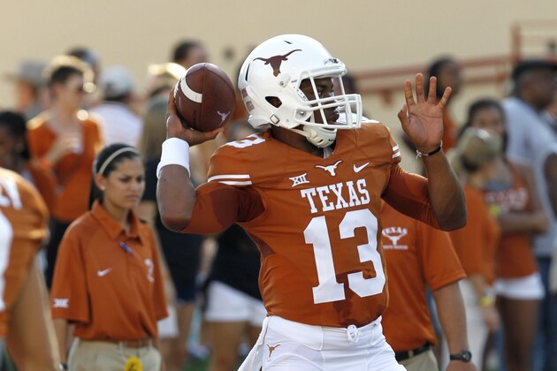 AUSTIN, TX - SEPTEMBER 6: Jerrod Heard #13 of the Texas Longhorns passes during pregame warmups before playing the BYU Cougars on September 6, 2014 at Darrell K Royal-Texas Memorial Stadium in Austin, Texas. (Photo by Chris Covatta/Getty Images)