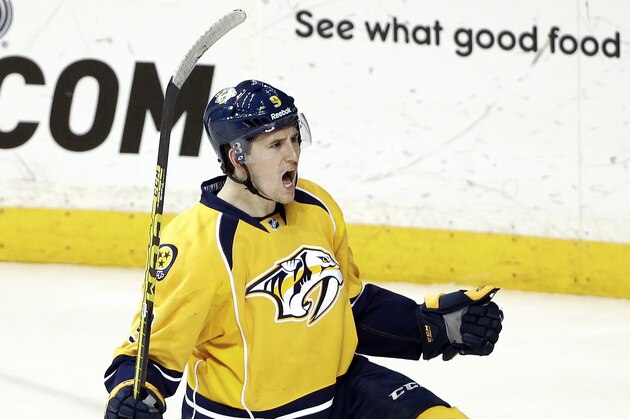 Nashville Predators center Filip Forsberg, of Sweden, celebrates after scoring the game-winning goal against the Montreal Canadiens in overtime at an NHL hockey game Tuesday, March 24, 2015, in Nashville, Tenn. The Predators won 3-2.(AP Photo/Mark Humphrey)