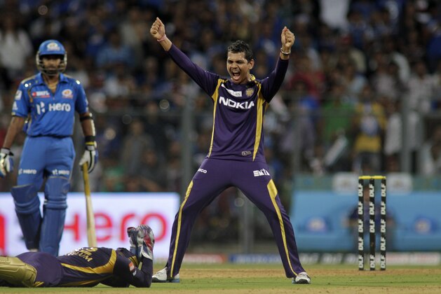 Kolkata Knight Riders Sunil Narine celebrates the dismissal of Mumbai Indians' Rohit Sharma during an Indian Premier League (IPL) cricket match in Mumbai, India, Wednesday, May 16, 2012. (AP Photo/ Rajanish Kakade)