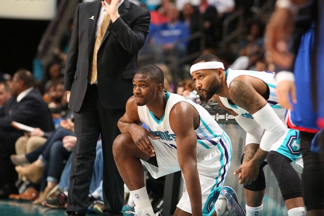 CHARLOTTE, NC - APRIL 4:  Noah Vonleh #11 and Mo Williams #7 of the Charlotte Hornets waits to check in during a game  against the Philadelphia 76ers during the game at the Time Warner Cable Arena on April 4, 2015 in Charlotte, North Carolina. NOTE TO USER: User expressly acknowledges and agrees that, by downloading and or using this photograph, User is consenting to the terms and conditions of the Getty Images License Agreement.  Mandatory Copyright Notice:  Copyright 2015 NBAE (Photo by Brock Williams-Smith/NBAE via Getty Images)