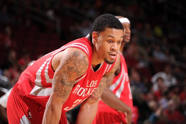 HOUSTON, TX - MARCH 27:  K.J. McDaniels #32 of the Houston Rockets during the game against the Minnesota Timberwolves on March 27, 2015 at the Toyota Center in Houston, Texas. NOTE TO USER: User expressly acknowledges and agrees that, by downloading and or using this photograph, User is consenting to the terms and conditions of the Getty Images License Agreement. Mandatory Copyright Notice: Copyright 2015 NBAE (Photo by Bill Baptist/NBAE via Getty Images)