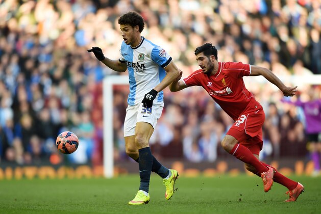LIVERPOOL, ENGLAND - MARCH 08:  Rudy Gestede of Blackburn is challenged by Emre Can of Liverpool during the FA Cup Quarter Final match between Liverpool and Blackburn Rovers at Anfield on March 8, 2015 in Liverpool, England.  (Photo by Michael Regan/Getty Images)
