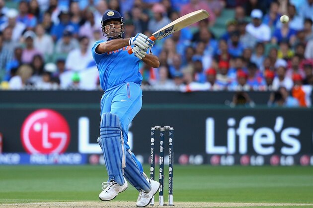 MELBOURNE, AUSTRALIA - MARCH 19: MS Dhoni of India bats during the 2015 ICC Cricket World Cup Quater Final match between India and Bangldesh at Melbourne Cricket Ground on March 19, 2015 in Melbourne, Australia.  (Photo by Quinn Rooney/Getty Images)